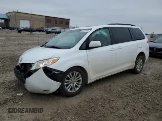 2012 Toyota Sienna XLE AAS with VIN 5TDYK3DCXCS273516, listed as a Copart auction lot 86527704 with 227,831 mi miles and Salvage Title. Bid and sale history available at carsss.com. Image 1.