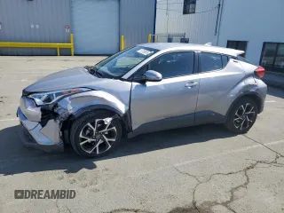 2018 Toyota C-HR XLE with VIN NMTKHMBX6JR047937, listed as a Copart auction lot 51705805 with 128,543 mi miles and Salvage Title. Bid and sale history available at DreamBid. Image 1.