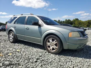 2006 Ford Freestyle Limited with VIN 1FMZK06186GA08280, listed as a Copart auction lot 70171254 with 153,371 mi miles and Salvage Title. Bid and sale history available at carsss.com. Image 4.