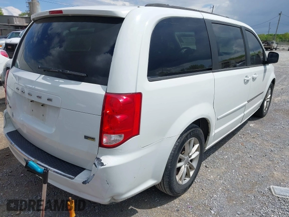 2014 Dodge Grand Caravan SXT with VIN 2C4RDGCG8ER264027, listed as a IAAI auction lot 42018350 with 311,876 mi miles and . Bid and sale history available at DreamBid. Image 4.