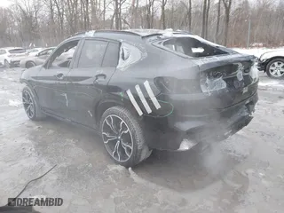 2020 BMW X4 M with VIN 5YMUJ0C01LLU67190, listed as a IAAI auction lot 41669132 with 55,609 mi miles. Bid and sale history available at carsss.com. Image 3.