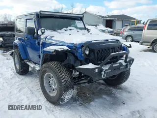 2010 Jeep Wrangler Sahara z VIN 1J4AA5D18AL170957, wystawiony jako IAAI lot #41599820 z przebiegiem 64 217 mil mil oraz . Historia ofert i sprzedaży dostępna na DreamBid. Obrazek 1.