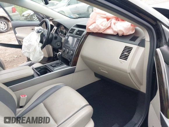2010 Mazda CX-9 Grand Touring with VIN JM3TB3MV9A0237626, listed as a IAAI auction lot 42608623 with 141,520 mi miles and . Bid and sale history available at DreamBid. Image 5.
