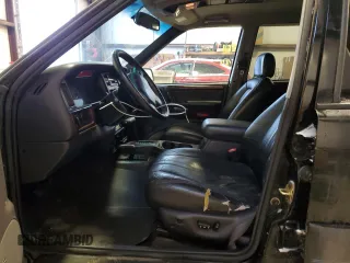 1998 Jeep Grand Cherokee Laredo with VIN 1J4GZ58Y9WC122076, listed as a Copart auction lot 84221784 with 387,353 mi miles and Salvage Title. Bid and sale history available at carsss.com. Image 7.