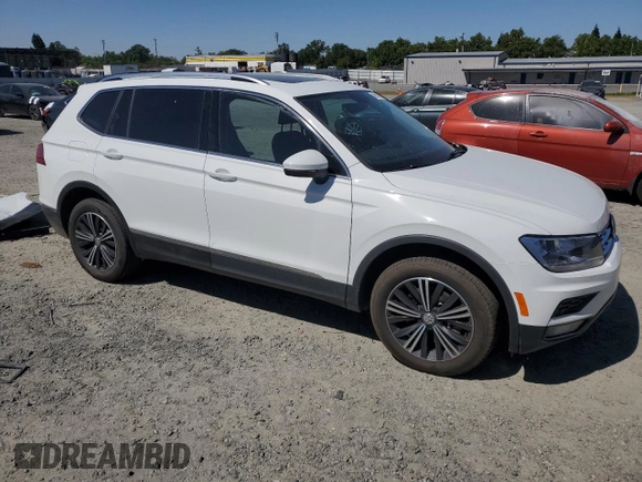 2019 Volkswagen Tiguan SE with VIN 3VV2B7AX5KM009947, listed as a Copart auction lot 54951455 with 90,569 mi miles and Salvage Title. Bid and sale history available at DreamBid. Image 4.