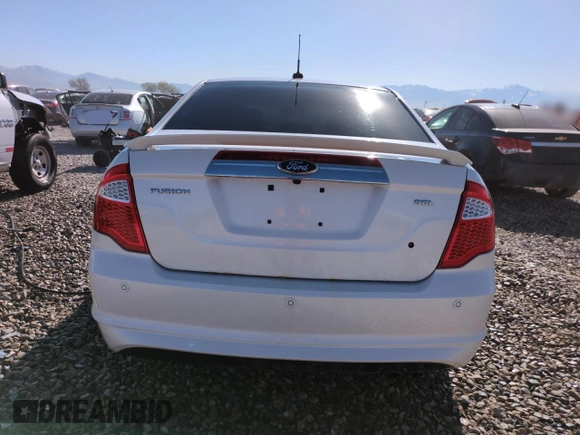 2012 Ford Fusion SEL z VIN 3FAHP0JA7CR434058, wystawiony jako Copart lot #52989875 z przebiegiem 109 914 mil mil oraz Szkoda całkowita • Salvage title. Historia ofert i sprzedaży dostępna na DreamBid. Obrazek 6.