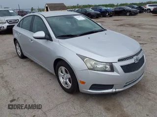 2013 Chevrolet Cruze 1LT with VIN 1G1PC5SB7D7203331, listed as a IAAI auction lot 42142672 with 189,883 mi miles and . Bid and sale history available at DreamBid. Image 1.