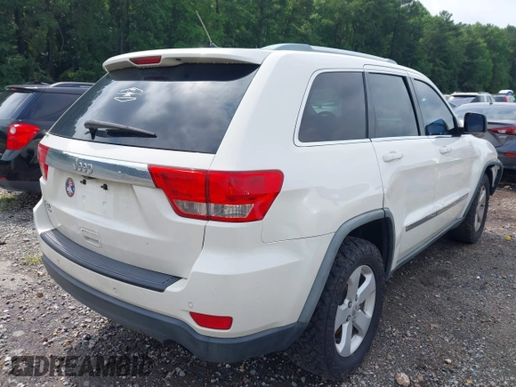 2011 Jeep Grand Cherokee Laredo with VIN 1J4RR4GG7BC701007, listed as a IAAI auction lot 42704995 with 145,956 mi miles and . Bid and sale history available at DreamBid. Image 4.