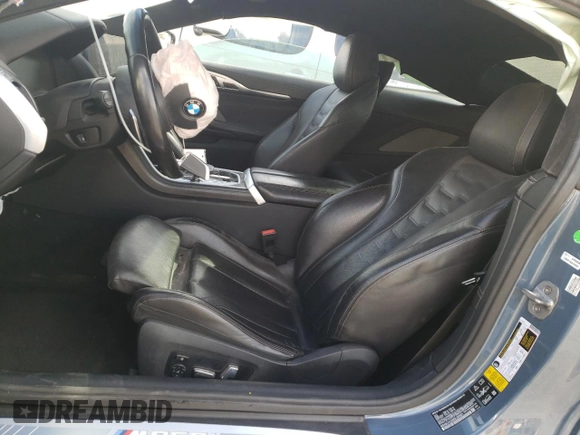 2019 BMW 8 Series M850i xDrive z VIN WBABC4C58KBJ35651, wystawiony jako Copart lot #84503014 z przebiegiem Nie podano mil oraz Szkoda całkowita • Salvage title. Historia ofert i sprzedaży dostępna na DreamBid. Obrazek 7.