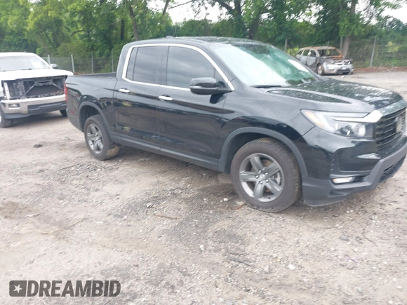 2023 Honda Ridgeline RTL-E with VIN 5FPYK3F77PB052828, listed as a IAAI auction lot 42366947 with 24,658 mi miles and . Bid and sale history available at DreamBid. Image 1.