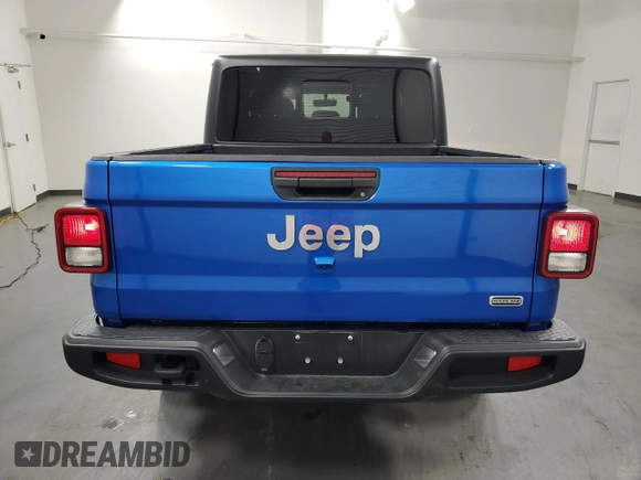 2023 Jeep Gladiator Overland z VIN 1C6HJTFG6PL564337, wystawiony jako Copart lot #59620315 z przebiegiem 31 552 mil mil oraz Czysty tytuł • Clean title. Historia ofert i sprzedaży dostępna na DreamBid. Obrazek 6.