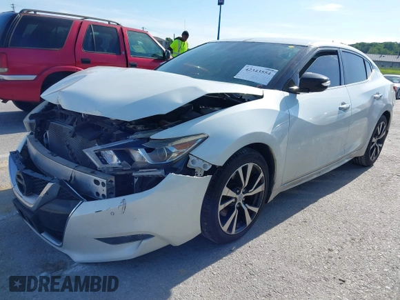 2017 Nissan Maxima SV with VIN 1N4AA6AP3HC389930, listed as a IAAI auction lot 42343554 with 128,926 mi miles and . Bid and sale history available at DreamBid. Image 2.