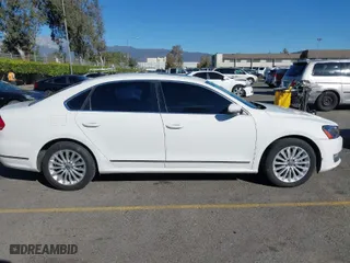 2015 Volkswagen Passat 1.8T SE w/Sunroof & Nav with VIN 1VWBT7A3XFC075648, listed as a IAAI auction lot 40808040 with 189,620 mi miles. Bid and sale history available at carsss.com. Image 13.