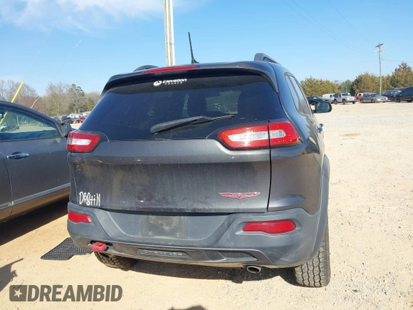 2014 Jeep Cherokee Trailhawk with VIN 1C4PJMBS6EW278987, listed as a IAAI auction lot 41789868 with 136,696 mi miles. Bid and sale history available at carsss.com. Image 17.