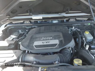 2018 Jeep Wrangler JK Unlimited Sport S with VIN 1C4BJWDG3JL900973, listed as a IAAI auction lot 41239817 with 50,952 mi miles. Bid and sale history available at carsss.com. Image 10.