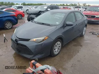 2019 Toyota Corolla L with VIN 5YFBURHE8KP873067, listed as a IAAI auction lot 41936471 with 75,076 mi miles and . Bid and sale history available at carsss.com. Image 2.