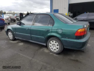 1999 Honda Civic VP with VIN 2HGEJ6610XH579794, listed as a Copart auction lot 47687515 with 229,343 mi miles and Salvage Title. Bid and sale history available at carsss.com. Image 2.