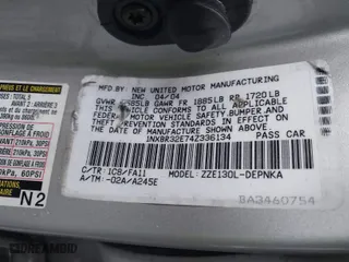 2004 Toyota Corolla CE with VIN 1NXBR32E74Z336134, listed as a IAAI auction lot 41966813 with 257,177 mi miles. Bid and sale history available at carsss.com. Image 9.