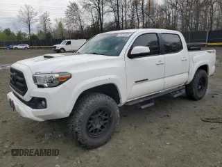 2016 Toyota Tacoma SR with VIN 5TFCZ5AN4GX016116, listed as a Copart auction lot 51673295 with 129,634 mi miles and Salvage title. Bid and sale history available at DreamBid. Image 1.