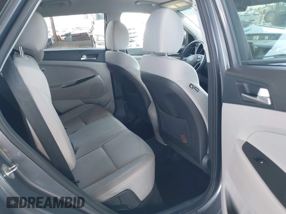 2021 Hyundai Tucson Value with VIN KM8J33A44MU403018, listed as a IAAI auction lot 42074597 with 63,654 mi miles and . Bid and sale history available at DreamBid. Image 8.