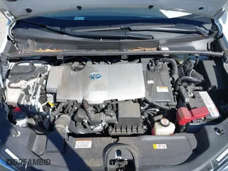 2021 Toyota Prius L Eco with VIN JTDKAMFUXM3142402, listed as a IAAI auction lot 41665484 with 67,416 mi miles. Bid and sale history available at carsss.com. Image 10.