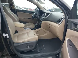 2017 Hyundai Tucson Value with VIN KM8J33A26HU362363, listed as a IAAI auction lot 41940376 with 127,986 mi miles. Bid and sale history available at carsss.com. Image 5.