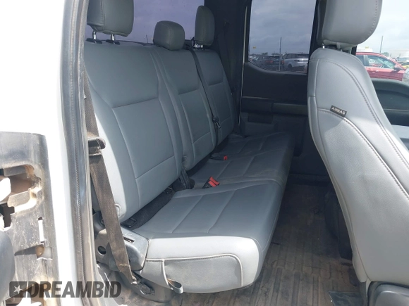 2021 Ford F-150 XL with VIN 1FTFX1E59MFC09787, listed as a IAAI auction lot 42162828 with 96,215 mi miles and . Bid and sale history available at DreamBid. Image 8.