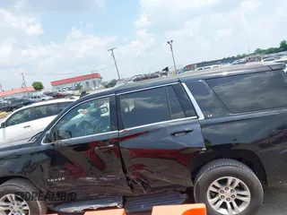 2019 Chevrolet Tahoe LT z VIN 1GNSKBKC5KR388869, wystawiony jako IAAI lot #42354451 z przebiegiem 111 359 mil mil oraz . Historia ofert i sprzedaży dostępna na DreamBid. Obrazek 14.