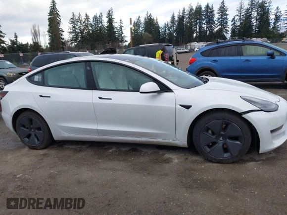 2021 Tesla Model 3 Long Range with VIN 5YJ3E1EB3MF856009, listed as a IAAI auction lot 41809767 with 42,072 mi miles. Bid and sale history available at carsss.com. Image 14.