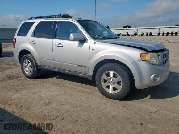 2008 Ford Escape Limited with VIN 1FMCU04108KA46976, listed as a Copart auction lot 60576595 with 177,256 mi miles and Salvage title. Bid and sale history available at DreamBid. Image 4.