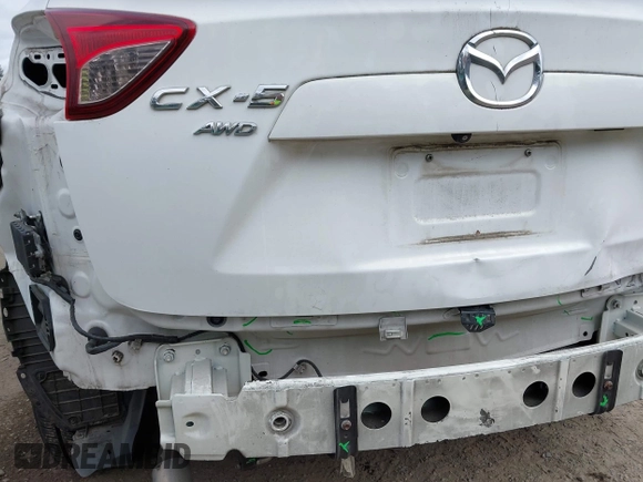 2015 Mazda CX-5 Touring with VIN JM3KE4CY4F0488484, listed as a IAAI auction lot 42115093 with 156,344 mi miles. Bid and sale history available at carsss.com. Image 19.