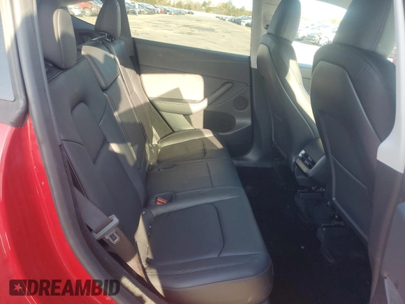 2023 Tesla Model Y Performance with VIN 7SAYGDEF4PF960357, listed as a Copart auction lot 51126105 with 37,252 mi miles and Salvage Title. Bid and sale history available at DreamBid. Image 11.