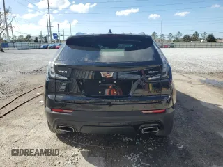 2021 Cadillac XT4 FWD Sport with VIN 1GYFZER44MF080872, listed as a Copart auction lot 86344534 with 23,865 mi miles and Salvage Title. Bid and sale history available at DreamBid. Image 6.
