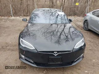 2017 Tesla Model S 100D with VIN 5YJSA1E25HF215778, listed as a IAAI auction lot 41692605 with Not Provided miles and . Bid and sale history available at DreamBid. Image 12.