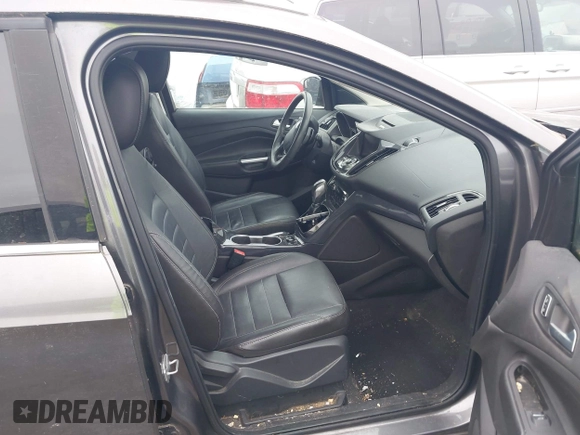 2014 Ford Escape Titanium with VIN 1FMCU0JX2EUA28679, listed as a IAAI auction lot 41930585 with 164,038 mi miles. Bid and sale history available at carsss.com. Image 5.