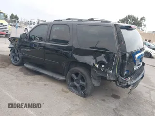 2013 Chevrolet Tahoe LT with VIN 1GNSKBE05DR152825, listed as a IAAI auction lot 41450863 with 157,305 mi miles and . Bid and sale history available at DreamBid. Image 3.