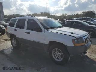 2002 Jeep Grand Cherokee Laredo with VIN 1J4GW48N02C205818, listed as a Copart auction lot 44737205 with 136,030 mi miles and Salvage Title. Bid and sale history available at carsss.com. Image 4.