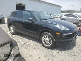 2016 Porsche Cayenne with VIN WP1AA2A26GKA10672, listed as a Copart auction lot 61855655 with 134,734 mi miles and Clean title. Bid and sale history available at DreamBid. Image 4.