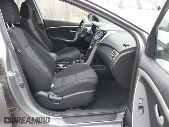 2013 Hyundai Elantra GT with VIN KMHD35LE0DU148382, listed as a IAAI auction lot 41898768 with 77,673 mi miles. Bid and sale history available at carsss.com. Image 5.