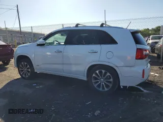 2014 Kia Sorento SX z VIN 5XYKWDA77EG522815, wystawiony jako Copart lot #56061415 z przebiegiem Nie podano mil oraz Czysty tytuł • Clean title. Historia ofert i sprzedaży dostępna na DreamBid. Obrazek 2.