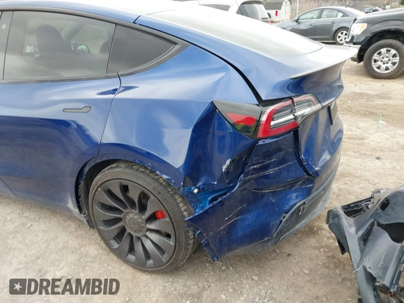 2020 Tesla Model Y Long Range with VIN 5YJYGDEF0LF000380, listed as a IAAI auction lot 41867489 with 66,294 mi miles and . Bid and sale history available at DreamBid. Image 6.