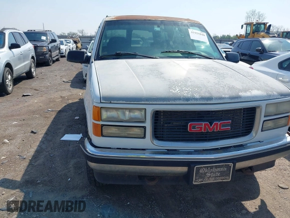 1996 GMC Yukon with VIN 1GKEK13R2TJ746811, listed as a IAAI auction lot 41955840 with 2,242,108 mi miles. Bid and sale history available at carsss.com. Image 17.