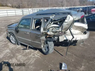 2010 Jeep Patriot Sport with VIN 1J4NF1GBXAD640562, listed as a IAAI auction lot 41869559 with 141,581 mi miles and . Bid and sale history available at DreamBid. Image 3.
