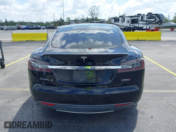 2015 Tesla Model S 85D with VIN 5YJSA1H21FFP79565, listed as a IAAI auction lot 42076401 with 162,139 mi miles. Bid and sale history available at carsss.com. Image 16.