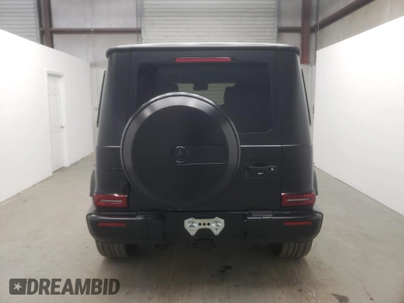 2022 Mercedes-Benz G 63 AMG with VIN W1NYC7HJ2NX444083, listed as a Copart auction lot 64764324 with 7,909 mi miles and Salvage title. Bid and sale history available at DreamBid. Image 6.