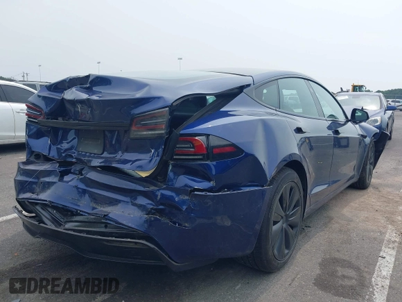 2022 Tesla Model S z VIN 5YJSA1E55NF493604, wystawiony jako IAAI lot #42503731 z przebiegiem 37 961 mil mil oraz . Historia ofert i sprzedaży dostępna na DreamBid. Obrazek 4.