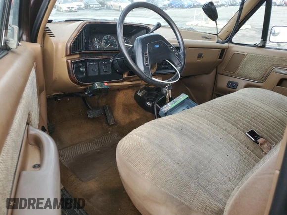 1991 Ford F-250 z VIN 1FTHX26G1MKB21130, wystawiony jako Copart lot #42222245 z przebiegiem 13 849 mil mil oraz Szkoda całkowita • Salvage title. Historia ofert i sprzedaży dostępna na DreamBid. Obrazek 8.