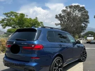 2020 BMW X7 xDrive40i z VIN 5UXCW2C06L0E74740, wystawiony jako Copart lot #55679695 z przebiegiem 21 686 mil mil oraz Szkody całkowita. Historia ofert i sprzedaży dostępna na DreamBid. Obrazek 4.
