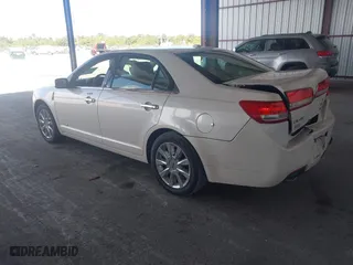 2012 Lincoln MKZ Hybrid with VIN 3LNDL2L3XCR832388, listed as a IAAI auction lot 42065660 with 196,940 mi miles. Bid and sale history available at carsss.com. Image 3.