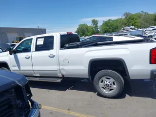 2016 GMC Sierra 2500HD SLE z VIN 1GT12SEG9GF180988, wystawiony jako IAAI lot #42321220 z przebiegiem 195 188 mil mil oraz . Historia ofert i sprzedaży dostępna na DreamBid. Obrazek 14.